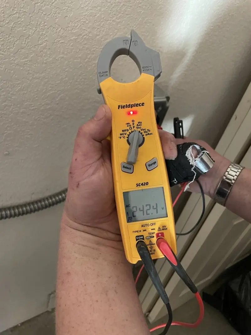 Voltage testing with clamp meter during Generator Installation in Buena Park